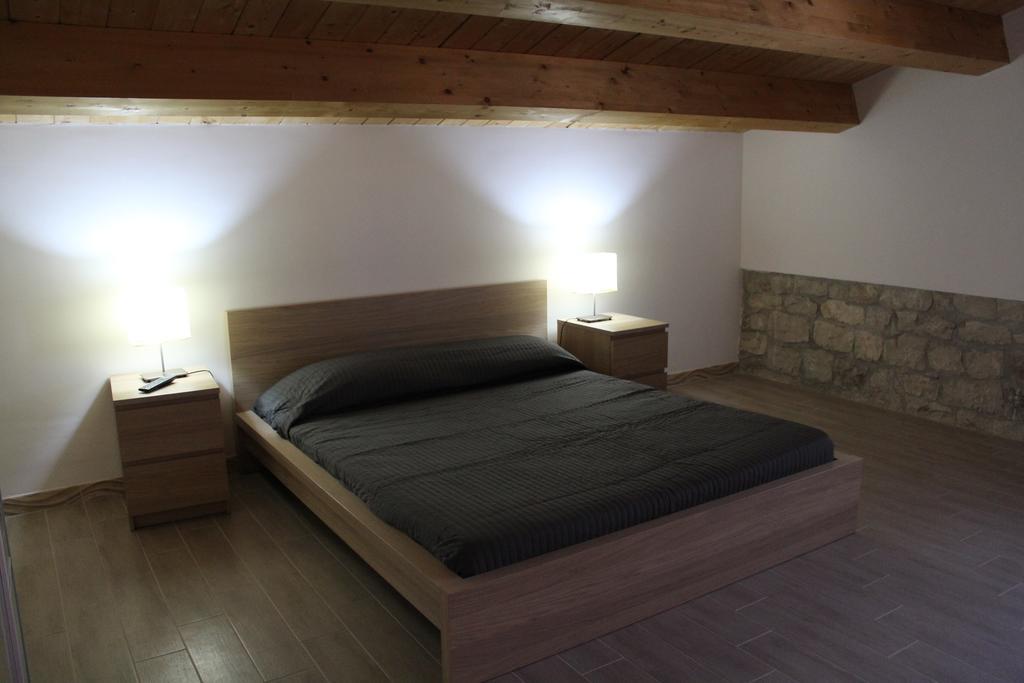 Appartamento Le Tre Palme Frigintini Szoba fotó
